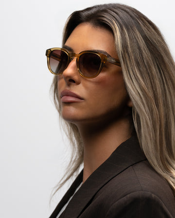 Milo Yellow round acetate sunglasses woman wearing