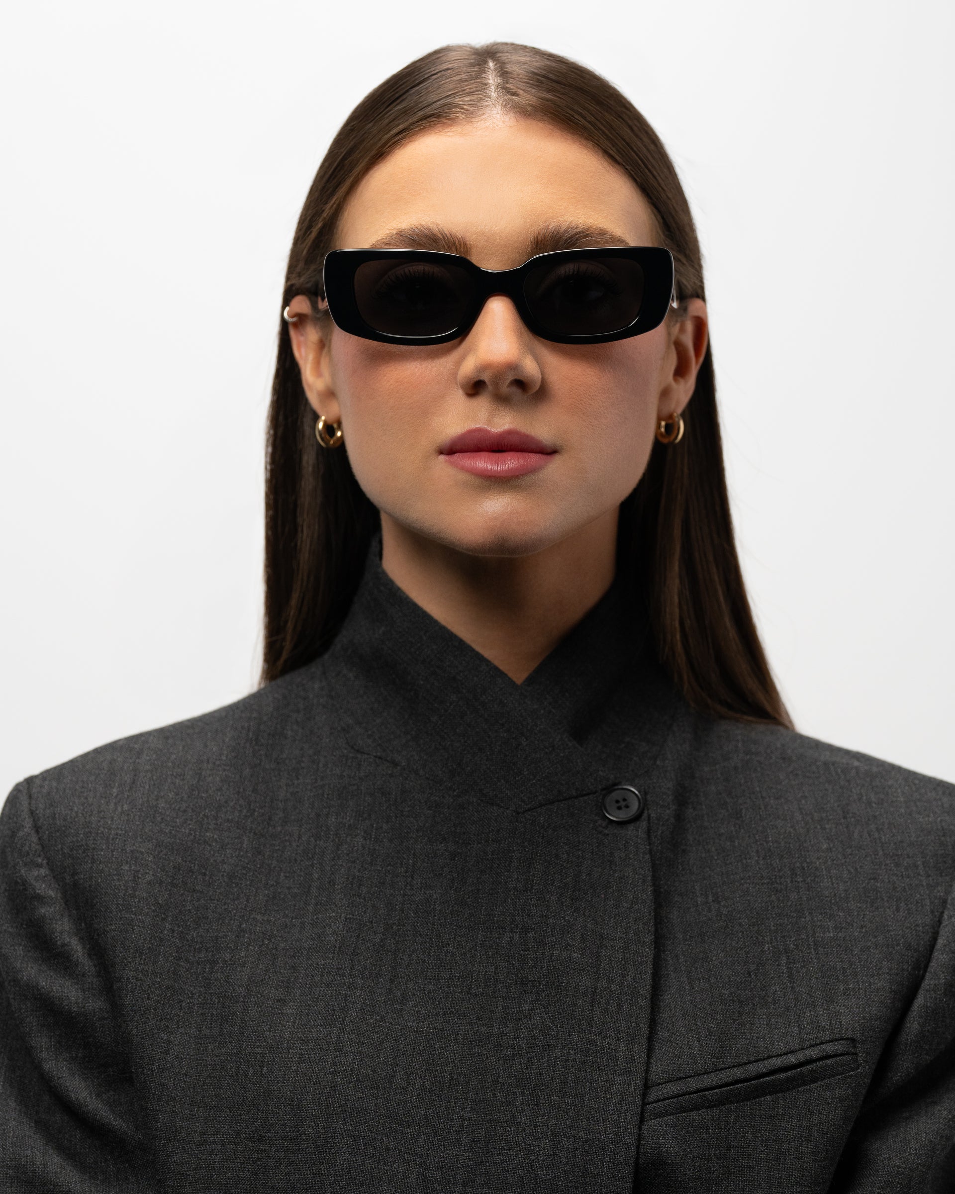 Trini Black rectangular sunglasses woman wearing