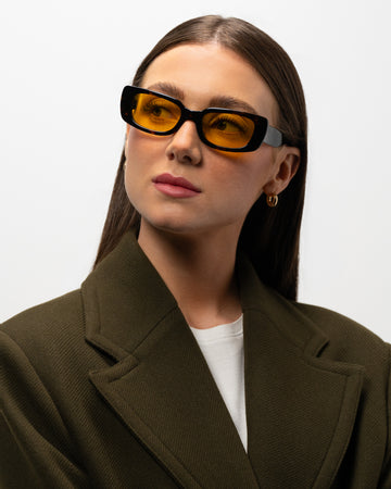 Trini Havana sunglasses yellow lenses woman wearing