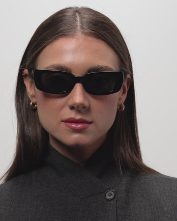 Trini Black rectangular sunglasses woman wearing slow motion
