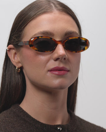 Bianca Classical Havana sunglasses woman wearing slow motion
